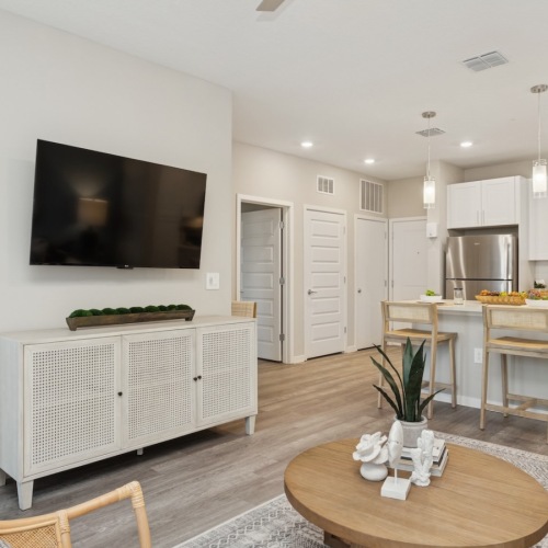 living room with a tv and coffee table