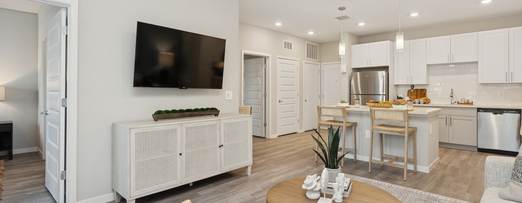 living room with a tv and coffee table