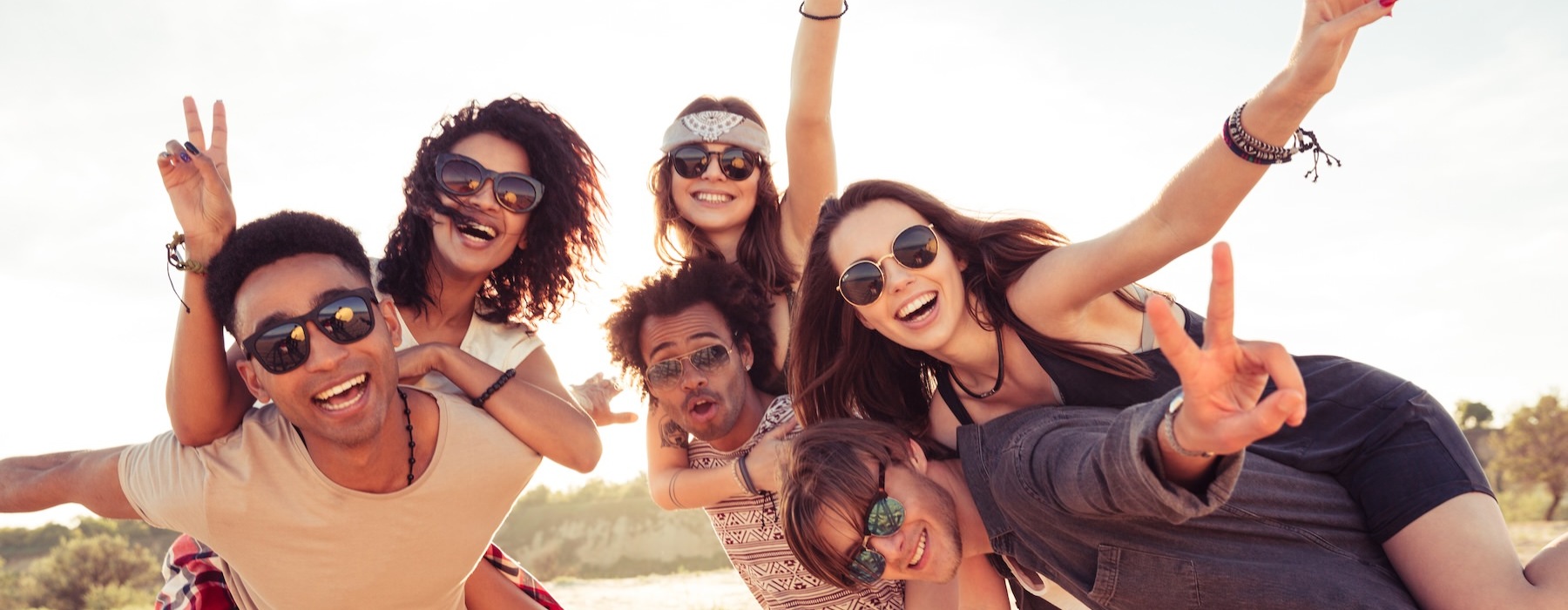 a group of friends on a beach